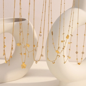 Exquisite 18K gold plated stainless steel layered necklaces with floral and leaf pendants
