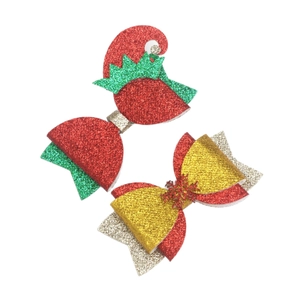 Sparkly Christmas bow hair clips set with sequins and glitter for holiday party styling