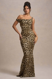 Close-up of leopard print fabric on a one-shoulder bodycon maxi dress with glossy texture