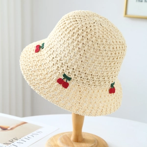 Handcrafted crochet straw sun hat in beige with decorative red cherry embroidery