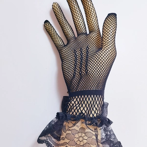 Detailed view of elegant black mesh lace glove with delicate floral trim for lolita style