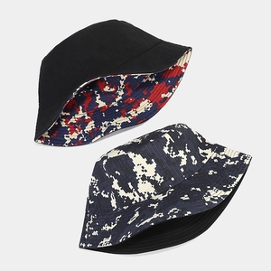 Reversible digital camo bucket hat for men and women showing both camouflage and plain sides