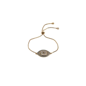 Detail view of gold Evil Eye slider bracelet with blue and black pavé stones