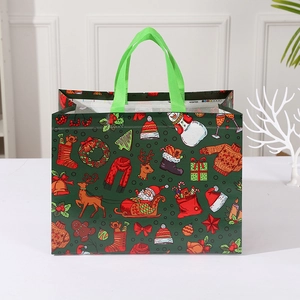 Christmas non-woven tote bag with snowman and Santa print for holiday gift packaging