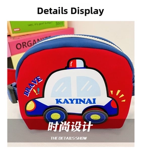 Detail view of red children's car bag featuring cartoon police car and brave text