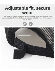 Detail of adjustable back strap and breathable mesh fabric on black sports cap