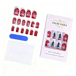 24pcs Christmas press-on nails featuring red and white snowflakes and Xmas tree designs