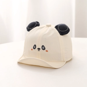 Detail of baby panda baseball cap with 3D ears and embroidered face on cotton fabric