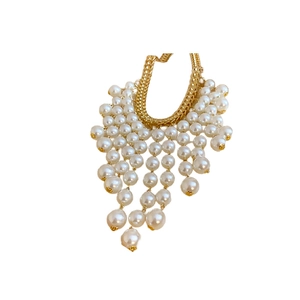 Elegant gold chain necklace with cascading white pearl tassels for a luxury look