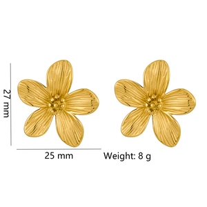 Golden flower earrings with fine texture measuring 27mm x 25mm in a minimalist style