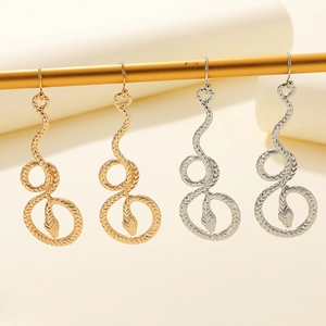 Vintage twisted snake drop earrings in gold and silver finish with textured metal scales