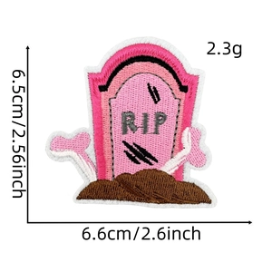 Detail showing pink RIP tombstone embroidery patch with size labels 6.5cm by 6.6cm