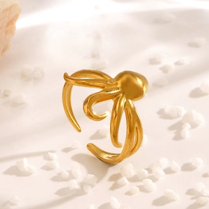 Minimalist golden metal octopus ring with adjustable tentacles in ocean style