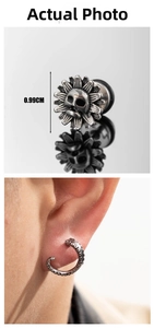 Macro detail of 0.99CM sunflower skull ear plug and textured punk steel earring