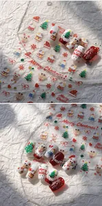 Detailed Christmas nail art stickers featuring 5D relief deer, trees, and cute holiday cats