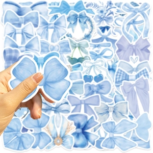 Close-up of blue cartoon bow stickers for DIY decoration on waterproof PVC material