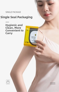 Close-up of disposable toilet seat cover in single sealed waterproof travel packaging