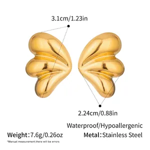 Detailed size view of polished golden butterfly wing earrings in stainless steel