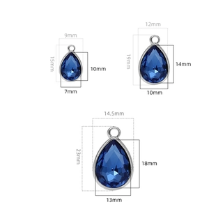 Blue teardrop crystal pendants with silver metal frames in three varying sizes