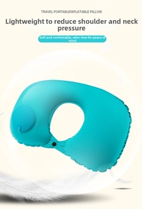 Macro detail of sky blue inflatable U-shaped neck pillow with built-in manual pump