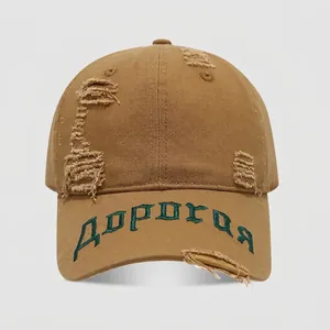 Detailed close-up of khaki distressed cotton baseball cap with green Russian embroidery