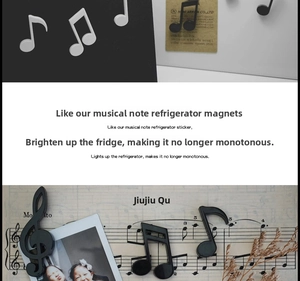 Detail showing musical note fridge magnets with treble clef and black eighth note designs