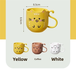 Detail showing dimensions of cute cat-shaped ceramic mug with ears and tail handle