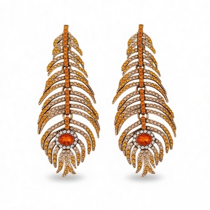 Vintage gold feather earrings with orange rhinestones and diamonds on a white background