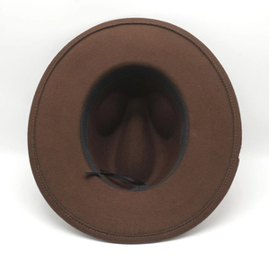 Detail view of the brown wool fedora hat showing internal sweatband and adjustable strap