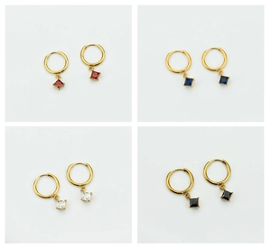 Detail shot of square zircon hoop earrings in red, blue, clear and black color variants