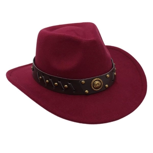 Detail of burgundy wool felt cowboy hat with leather band and gold metallic studs