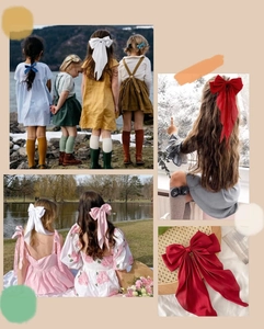 Detail of oversized satin bow hair clip with long ribbons shown in multiple colors