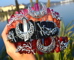 Detail of handmade cat ear crystal crowns with moon ornaments and wire wrapping