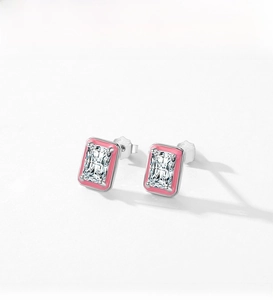 Macro view of S925 sterling silver rectangular stud earrings with pink enamel border