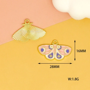 Detailed macro view of moth butterfly alloy pendant showing 28mm size and enamel finish