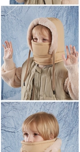 Detail of kids winter fleece-lined hood and face mask with windproof thermal ear flaps
