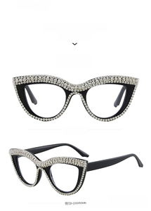 Detailed views of black cat-eye reading glasses with hand-set rhinestones in two angles