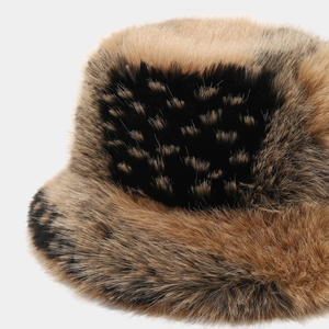 Close-up of leopard print faux fur bucket hat showing soft plush texture and pattern