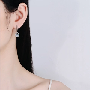 Elegant s925 silver moissanite drop earrings featuring a classic round halo design