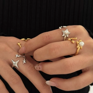 Elegant gold and silver starburst open rings with pearl accents for women