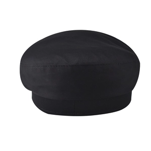 Detailed view of the stitching and high-quality black cotton fabric on the military beret