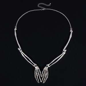 Detailed view of silver alloy skeleton hand necklace with gothic adjustable chain link