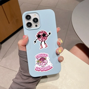 Close-up of Y2K disco girl stickers on light blue iPhone Pro TPU phone case