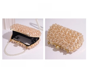 Detail view of champagne pearl evening bag showing interior space for a smartphone