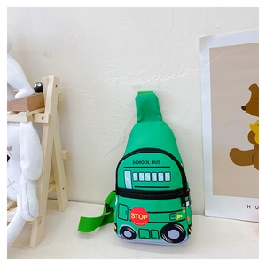 Detail view of a green school bus shaped kids chest bag with durable nylon material