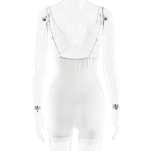 Detailed back view of white lace trim bodysuit featuring adjustable thin straps and soft fabric