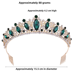 Detail view of gold alloy bridal crown with green gems and dimensions of 4.2cm height