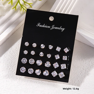 Set of 12 pairs cubic zirconia stud earrings in round heart and square shapes on black card
