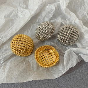 Minimalist textured dome ball stud earrings in gold and silver finish with grainy detail