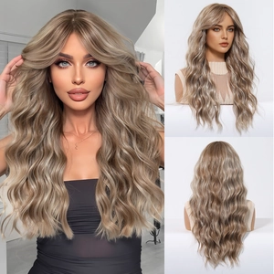 Detail showing wavy texture and French bangs of this long ash blonde synthetic wig